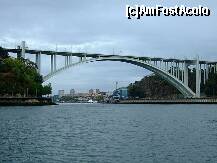 [P11] Ponte D'Arrábida, Porto, Portugalia este un pod cu arcuri peste râul Douro ce leagă Vila Nova de Gaia de oraş. Lungimea totală este de 615 metri. Platforma se înalţă la 70 metri deasupra apei. La vremea construcţiei sale, în 1963, avea cea mai mare deschidere de beton din lume. » foto by badge®
 - 
<span class="allrVoted glyphicon glyphicon-heart hidden" id="av175478"></span>
<a class="m-l-10 hidden" id="sv175478" onclick="voting_Foto_DelVot(,175478,5760)" role="button">șterge vot <span class="glyphicon glyphicon-remove"></span></a>
<a id="v9175478" class=" c-red"  onclick="voting_Foto_SetVot(175478)" role="button"><span class="glyphicon glyphicon-heart-empty"></span> <b>LIKE</b> = Votează poza</a> <img class="hidden"  id="f175478W9" src="/imagini/loader.gif" border="0" /><span class="AjErrMes hidden" id="e175478ErM"></span>