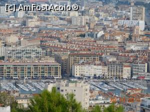 [P03] Chiar şi de la Bazilica Notre Dame de la Garde privind spre Vieux Port, sus, în dreapta, clădirea Toyoko Inn se vede albă şi un pic altfel faţă de restul edificiilor » foto by irinad
 - 
<span class="allrVoted glyphicon glyphicon-heart hidden" id="av1127528"></span>
<a class="m-l-10 hidden" id="sv1127528" onclick="voting_Foto_DelVot(,1127528,25927)" role="button">șterge vot <span class="glyphicon glyphicon-remove"></span></a>
<a id="v91127528" class=" c-red"  onclick="voting_Foto_SetVot(1127528)" role="button"><span class="glyphicon glyphicon-heart-empty"></span> <b>LIKE</b> = Votează poza</a> <img class="hidden"  id="f1127528W9" src="/imagini/loader.gif" border="0" /><span class="AjErrMes hidden" id="e1127528ErM"></span>